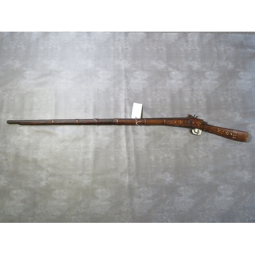 18 - A 19TH CENTURY INDIAN / MIDDLE EASTERN JAZAIL RIFLE, fitted with a percussion lock, inlaid bone deco... 