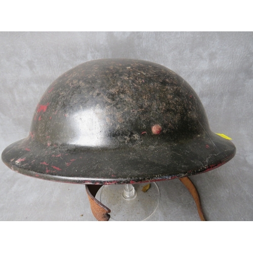 48 - A BRITISH WW2 'PLASFORT' HELMET, faintly marked ARP to the underside of the rim