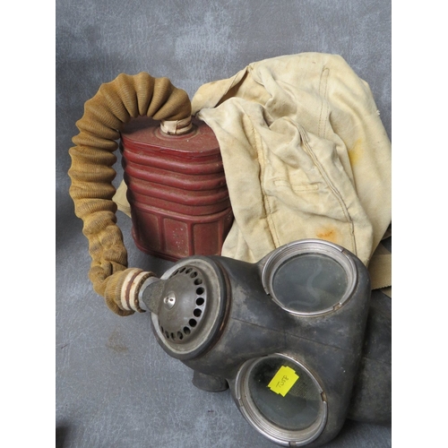 75 - A WW2 ARP GAS MASK IN BAG, (with reissue markings to bag to HMP 1952), along with a 1970s Russian ma... 