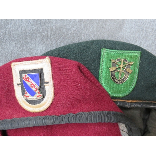 94 - TWO US SPECIAL FORCES BERETS, a dark green example (possibly 10th Div.) and a dark red example (2)