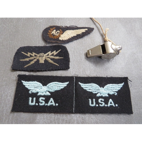 155 - R.A.F. INTEREST, consisting of a WWI air crew whistle, an A.G. cloth wing wireless operator patch an... 