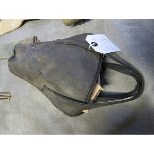 187 - A QUANTITY OF WWII ERA BELTS AND POUCHES ETC., to include a ladies gas mask, hand bag and a 1944 dat... 