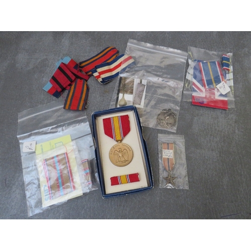 206 - A SMALL COLLECTION OF WORLD MEDALS, to include US silver star, US air force medal, France Croix De G... 