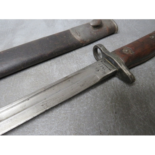 261 - A BRITISH 1907 PATTERN BAYONET, with issue mark 3 18, with plain wooden grip, makers mark for Wilkin... 