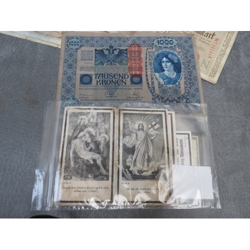 285 - FOUR WW2 GERMAN DEATH CARDS, and a small quantity of German stamps and a quantity of world banknotes