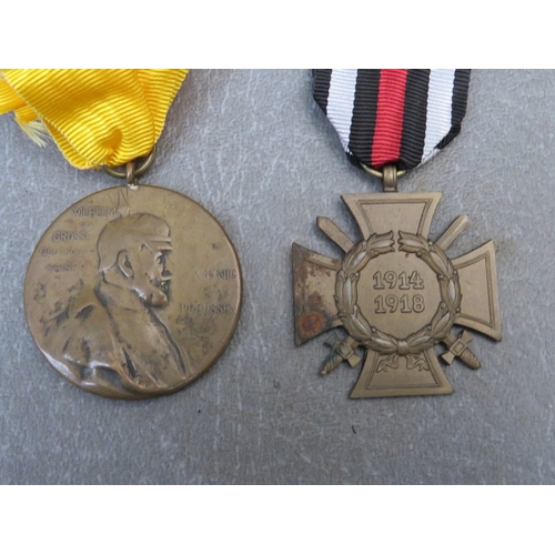 288 - A GERMAN 1914-1918 HONOUR CROSS, Prussia 1847 medal and two bars of German ribbons