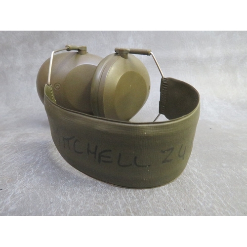 320 - A US ARMY AIR CORPS FLYING HELMET A.9., and a pair of ear protectors