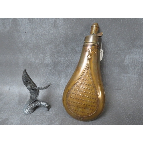 338 - AN ANTIQUE COPPER POWDER FLASK, with embossed decoration and a quantity of pen / pocket knives