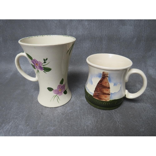 362 - A MOORCROFT 'KILN' MUG, dated 1986, H 9 cm, together with another taller floral mug (2)