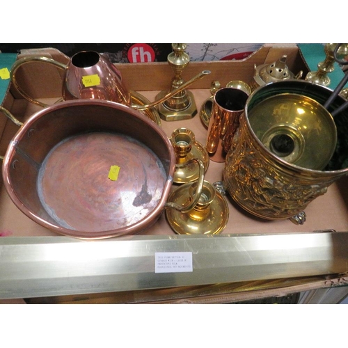 103 - A tray of assorted metal ware to include brass candlesticks