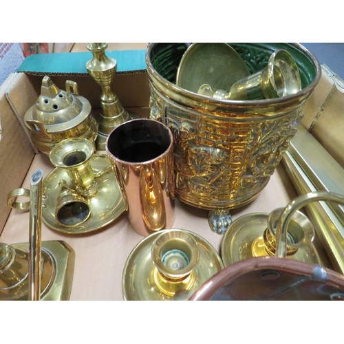 103 - A tray of assorted metal ware to include brass candlesticks