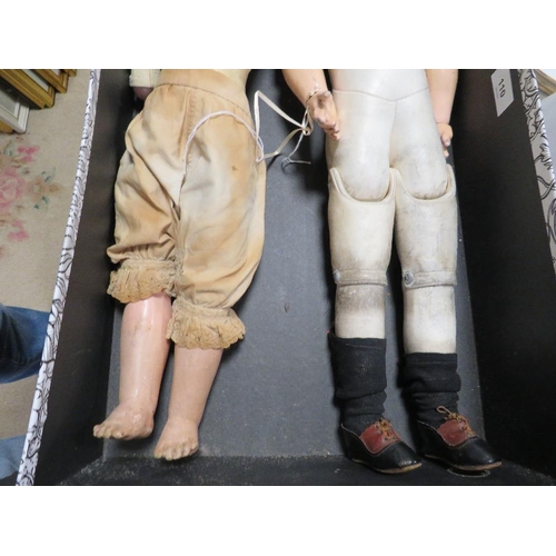 110 - Two late 18th /early 19th century leather bodied dolls with porcelain arms and legs one marked verso... 