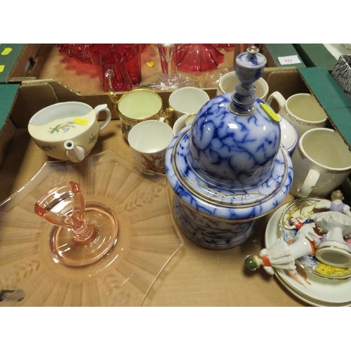 111 - Two trays of glass and ceramics to include a cranbury glass epergne, candlesticks etc