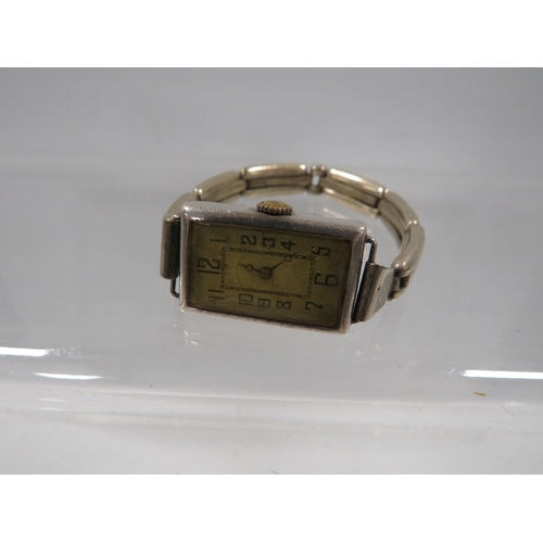 414 - A ladies Art-Deco silver cased wristwatch