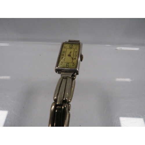 414 - A ladies Art-Deco silver cased wristwatch