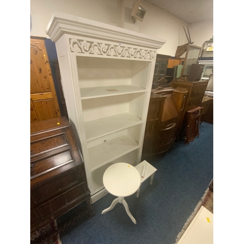 788 - A cream open bookcase together with a small broken table and a wine table. (3)