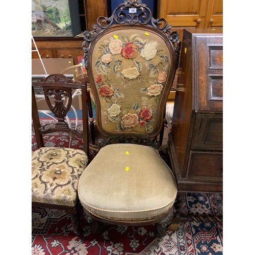 790 - An antique mahogany upholstered carved chair