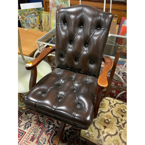 791 - A reproduction swivel office armchair