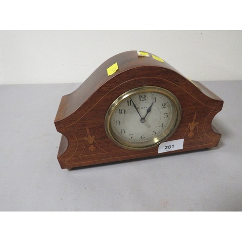 281 - A small inlaid eight day mantle clock