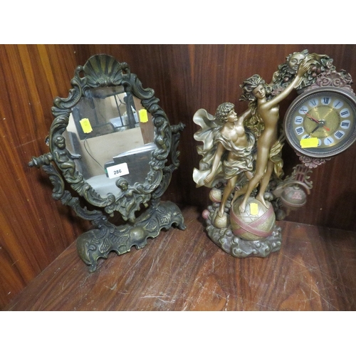 286 - A decorative dressing table mirror together with a modern ornate clock together with a wall mirror