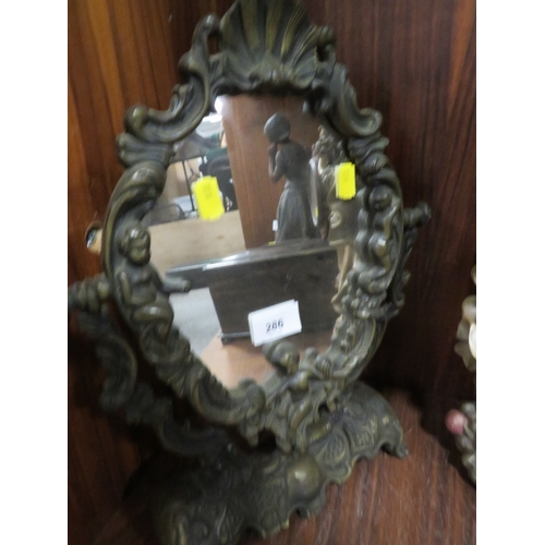 286 - A decorative dressing table mirror together with a modern ornate clock together with a wall mirror