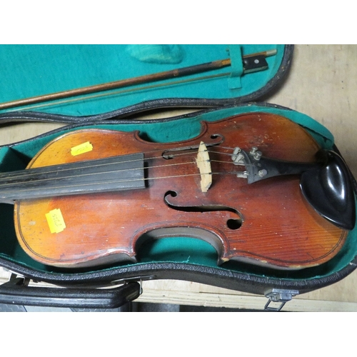 306 - A cased violin and bow A/F