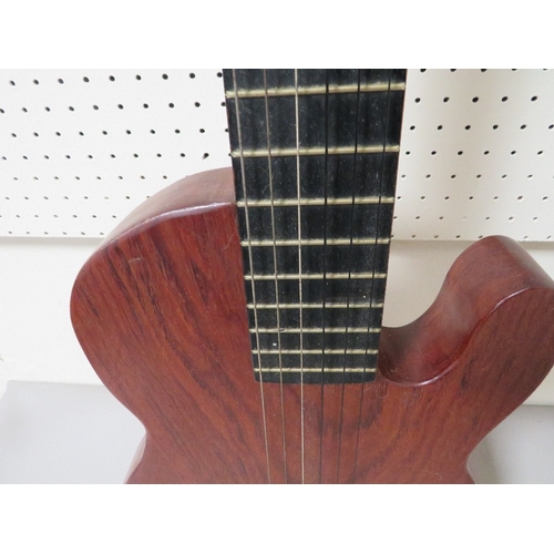 307 - A heavy homemade solid wood guitar