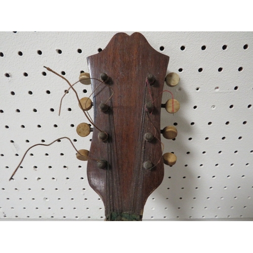 308 - An Italian inlaid mandolin style instrument stamped Giuseppe Indelicato of Cantania