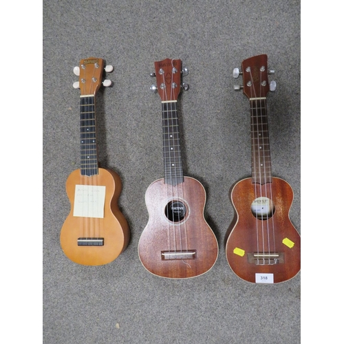 318 - Three ukuleles