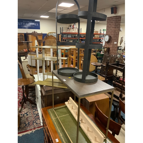 804 - Two modern metal wall racks together with a pair of wooden stands and a modern table and coat hooks