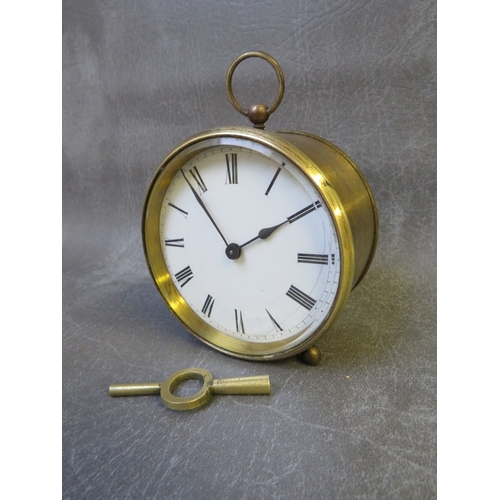 289 - A 19th century circular brass cased 8 day carriage clock with key