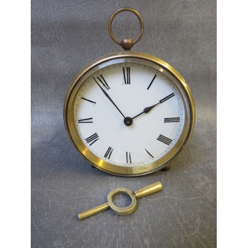 289 - A 19th century circular brass cased 8 day carriage clock with key