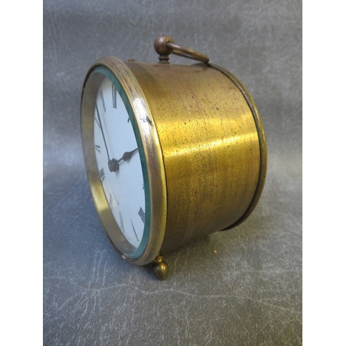 289 - A 19th century circular brass cased 8 day carriage clock with key