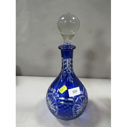 320 - A decanter together with a glass vase A/F