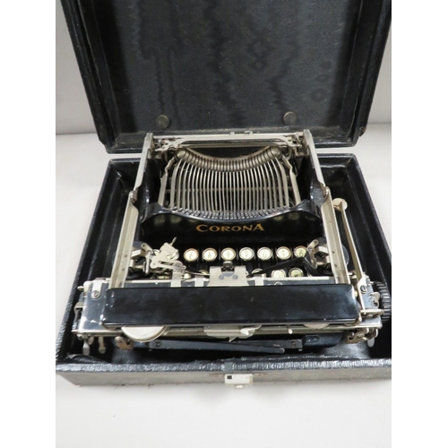 333 - An antique portable Corona cased typewriter