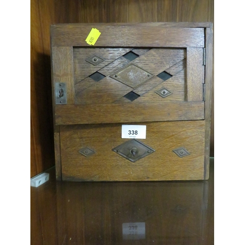 338 - A vintage mahogany smokers cabinet