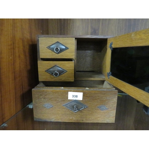 338 - A vintage mahogany smokers cabinet