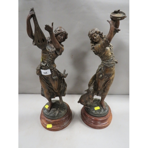 344 - Two cast metal figures A/F