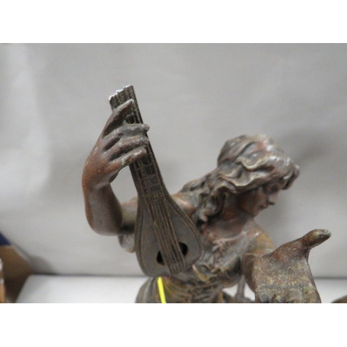 344 - Two cast metal figures A/F