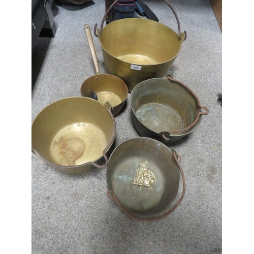 349 - A collection of brass jam pans etc