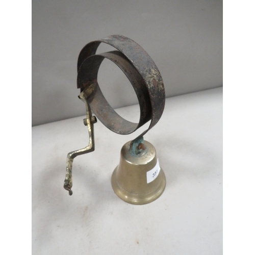 351 - A spring mounted brass shop door bell