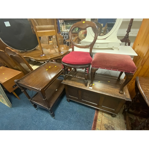 827 - An oak blanket box together with a stool, child’s chair and an oak trolley. (4)