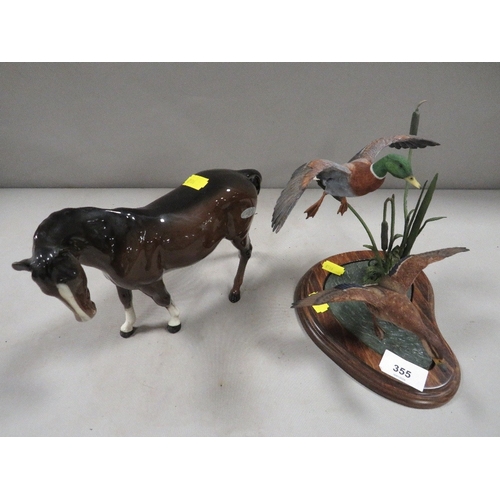 355 - A Beswick horse together with a country artists flying duck display