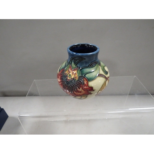 357 - A small Moorcroft squat vase with box