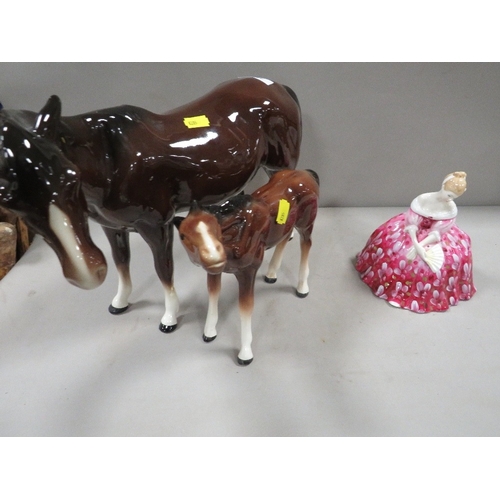 369 - Two Melba ware horses together with a boxed Doulton figurine