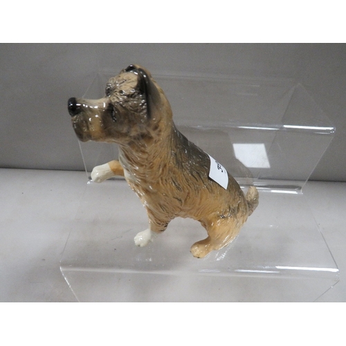 396 - A Royal Doulton 'Give Me A Home' figure of a terrier dog DA196