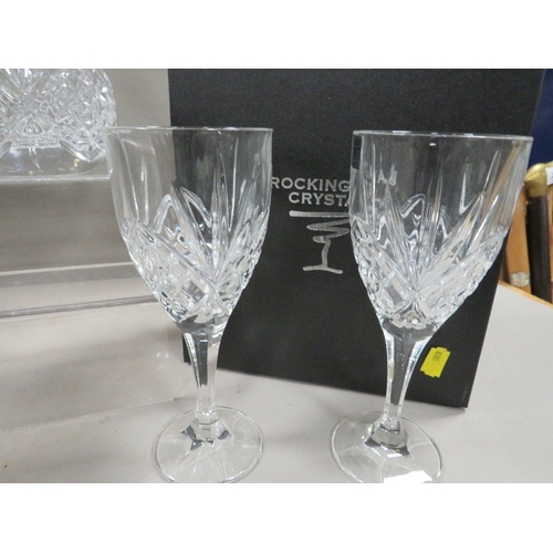 410 - A Rockingham Crystal cut glass decanter and two glasses