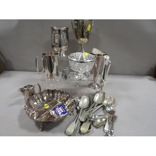 411 - A small tray of silver plated ware