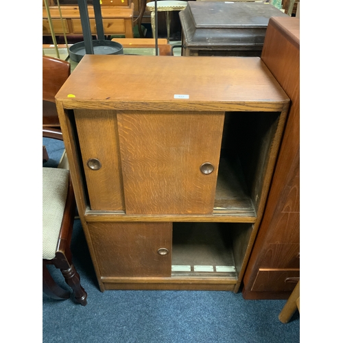 833 - A vintage record cabinet