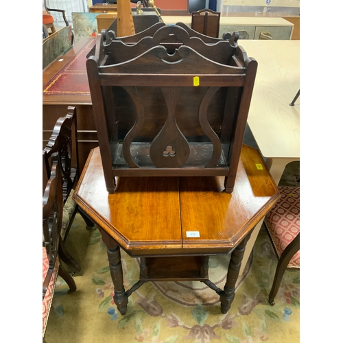 835 - An Edwardian table and oak paper rack. (2)